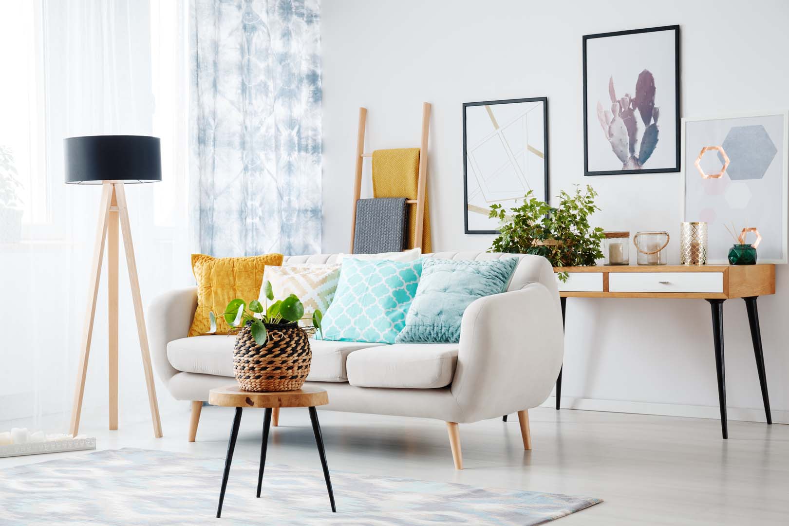 Beige Sofa With Blue And Yellow Cushions